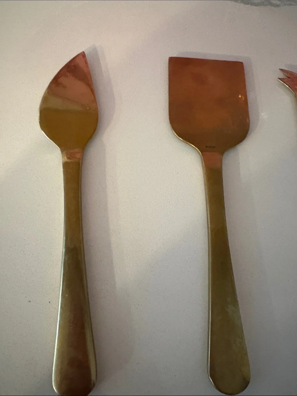 Set of eight Gold toned cheese, serving accessories purchase from pottery barn